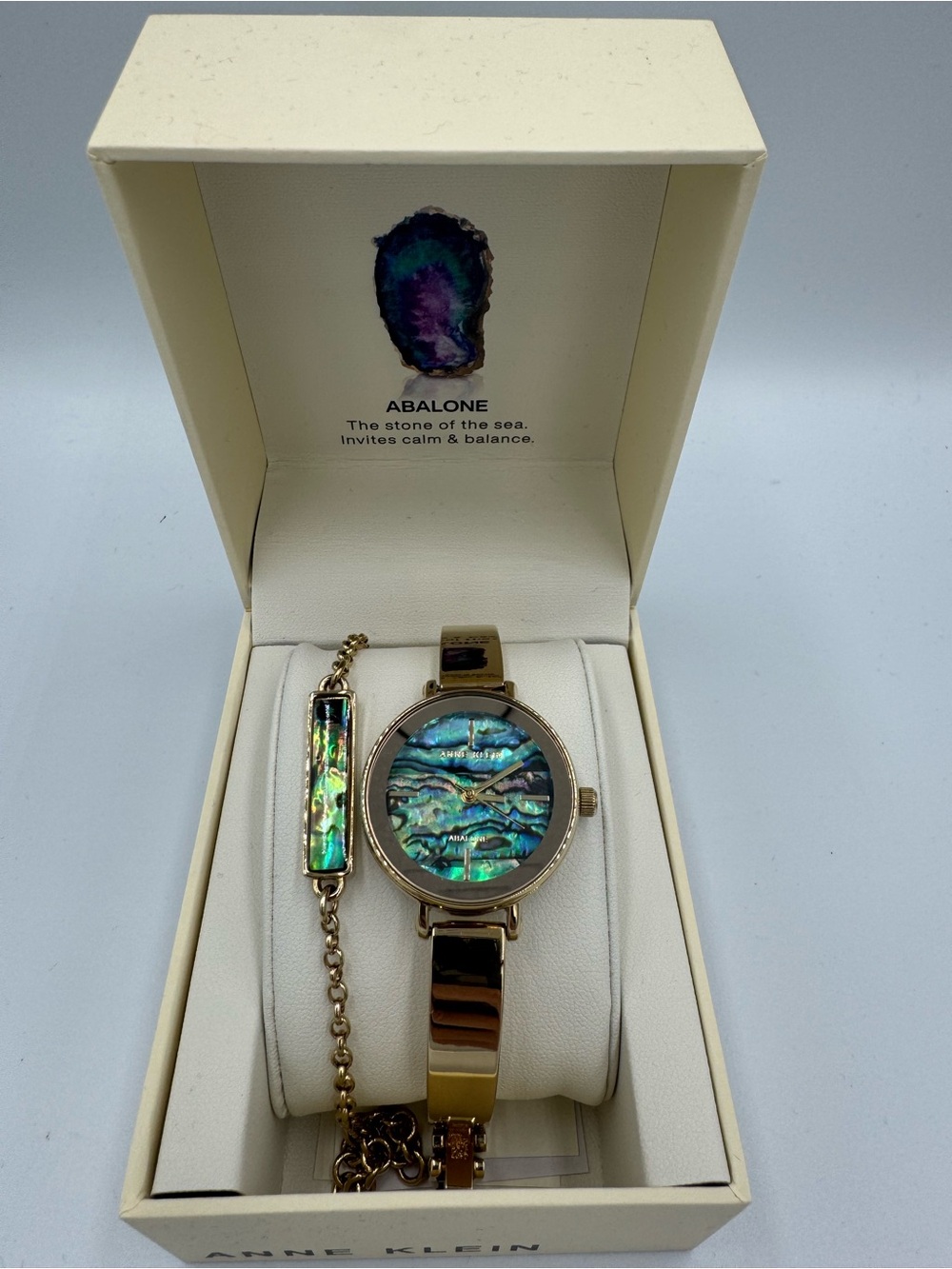 Anne Klein Gold-Tone Watch with Iridescent Abalone Dial and Bracelet Accent - Picture 2 of 9